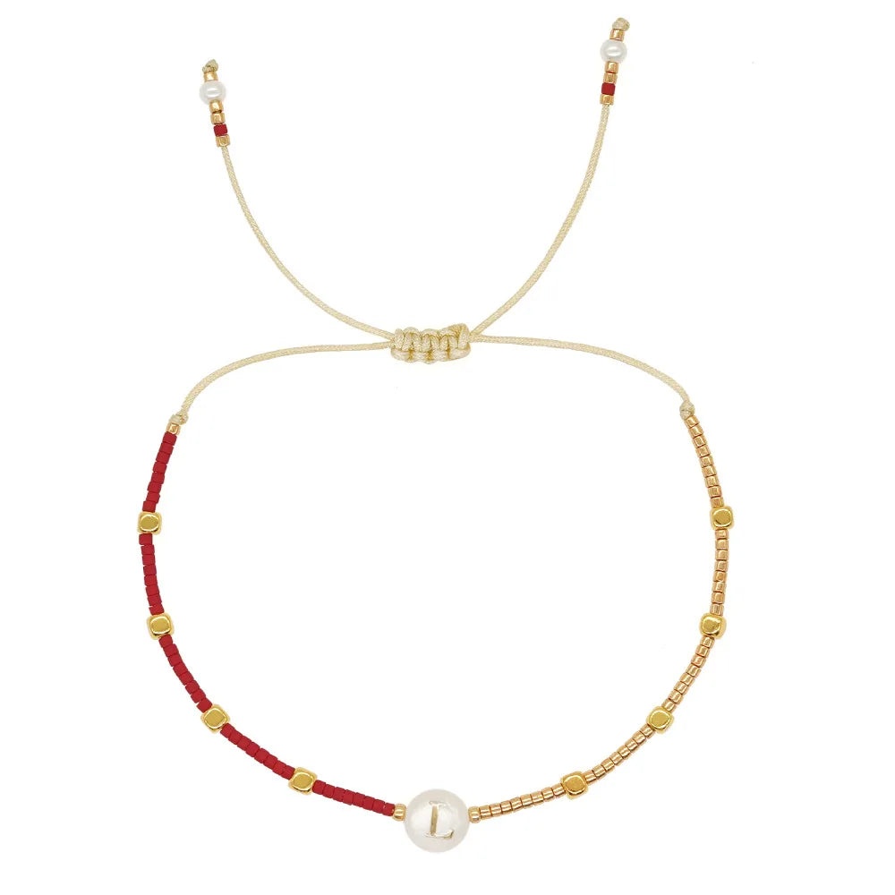 Two-tone initial bracelet l