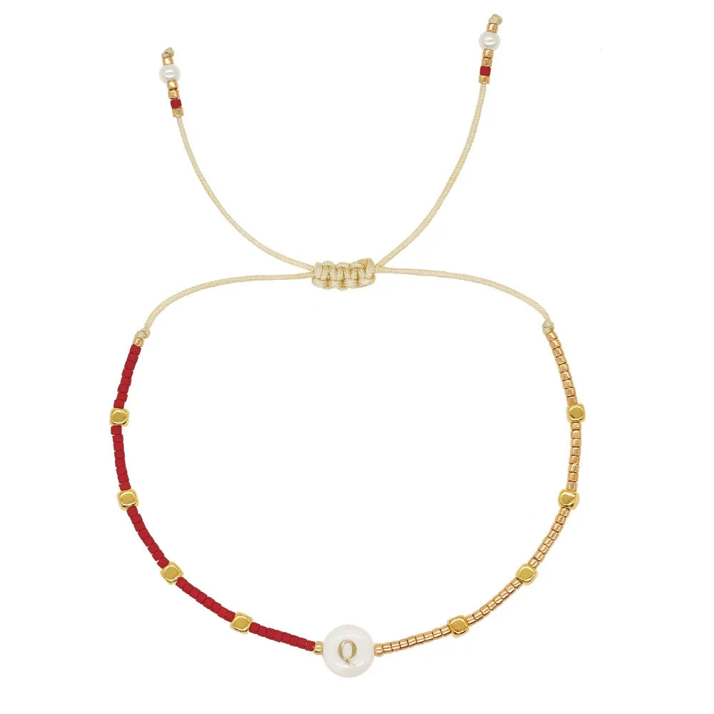 Two-tone initial bracelet q
