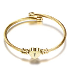 Heart bracelet with gold initial v