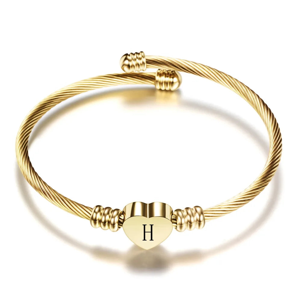 Heart bracelet with gold initial h