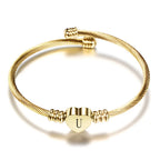 Heart bracelet with gold initial u