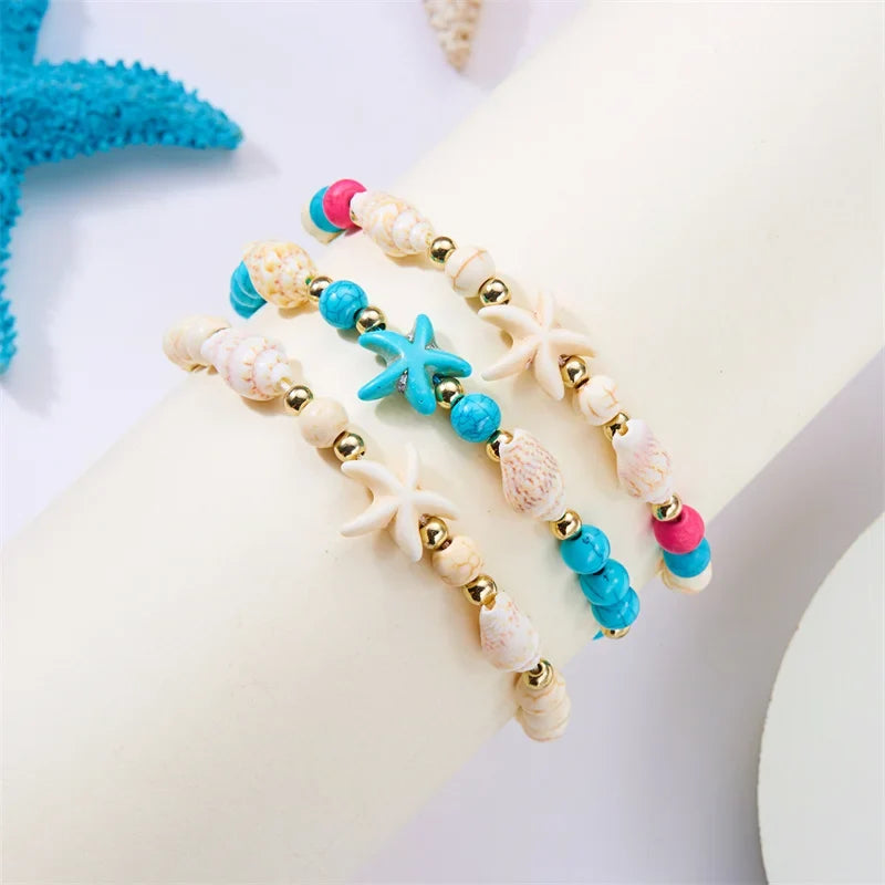 Cord bracelet with shell and blue starfish star