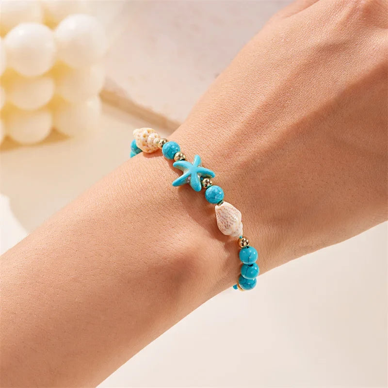 Cord bracelet with shell and blue starfish star