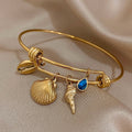 Gold Seashell Charm Bracelet