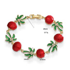 Green enamel palm bracelet with red shells
