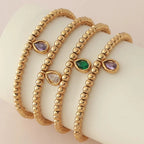 Gold-tone bracelet with birthstone for women