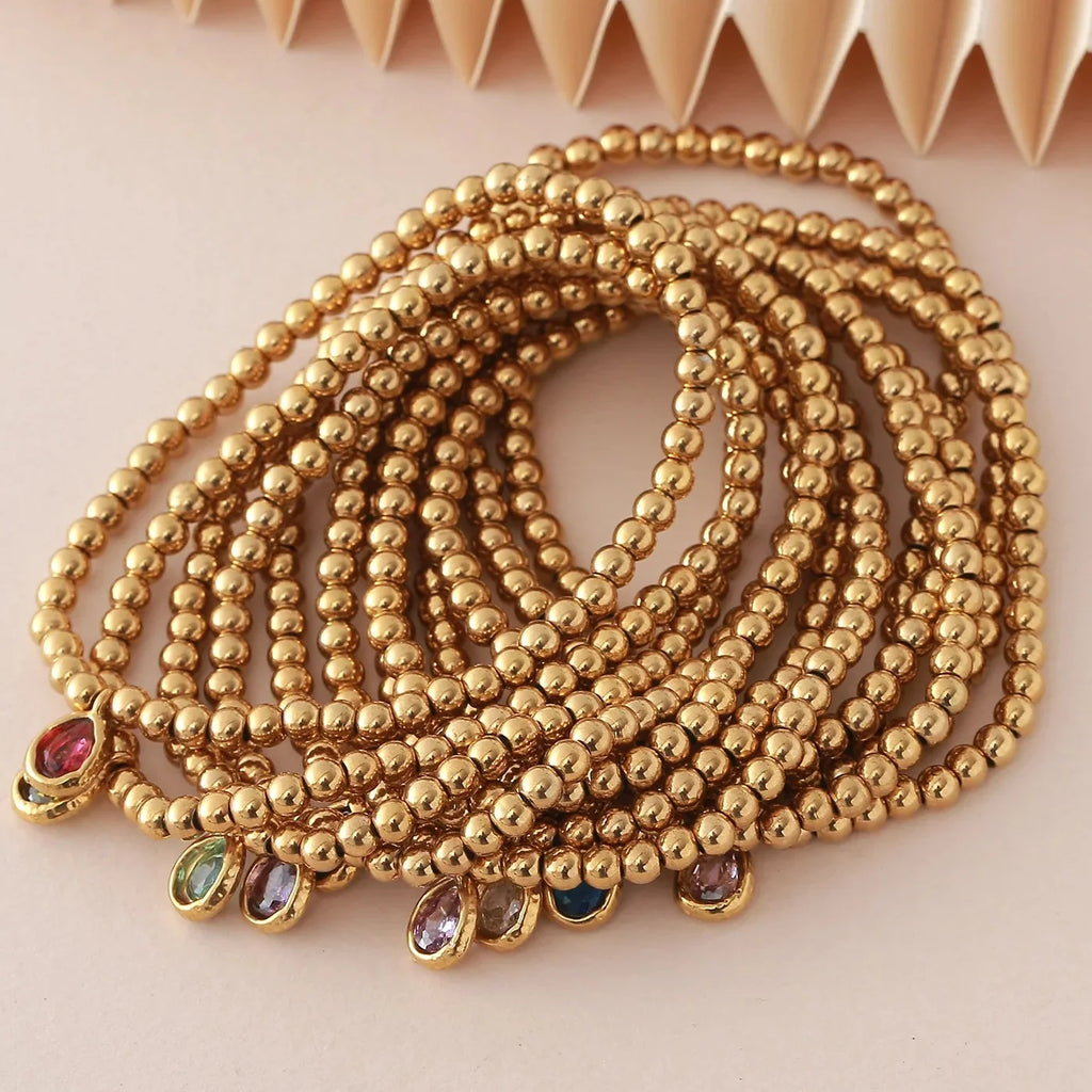 Gold-tone bracelet with birthstone for women