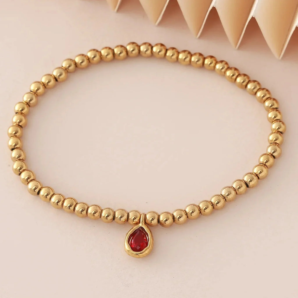 Gold-tone bracelet with birthstone for women