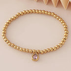 Gold-tone bracelet with birthstone for women