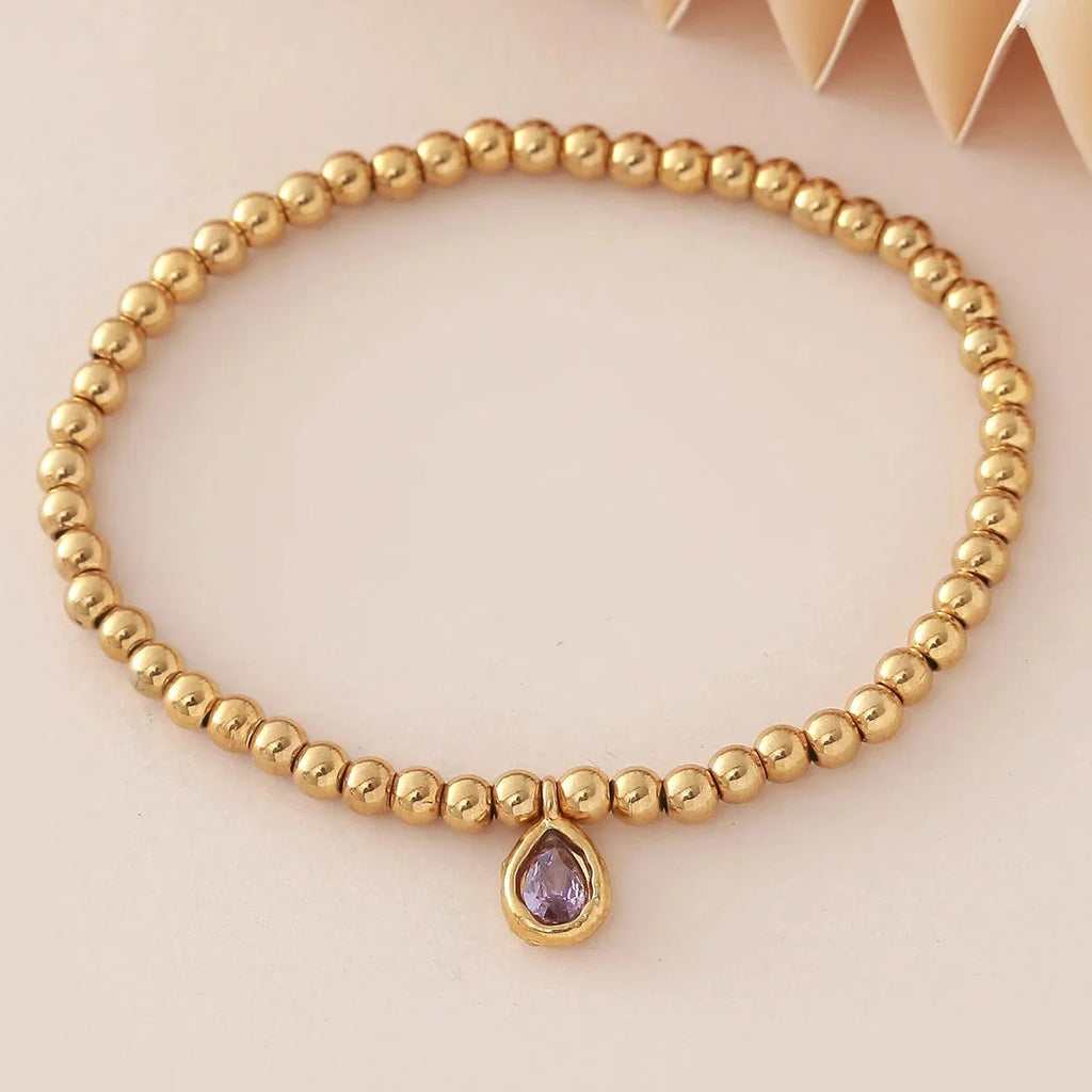 Gold-tone bracelet with birthstone for women