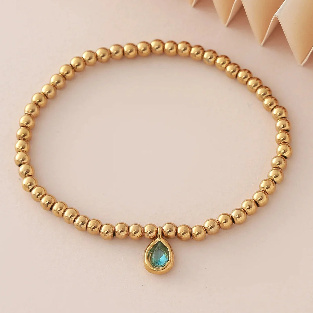 Gold-tone bracelet with birthstone for women