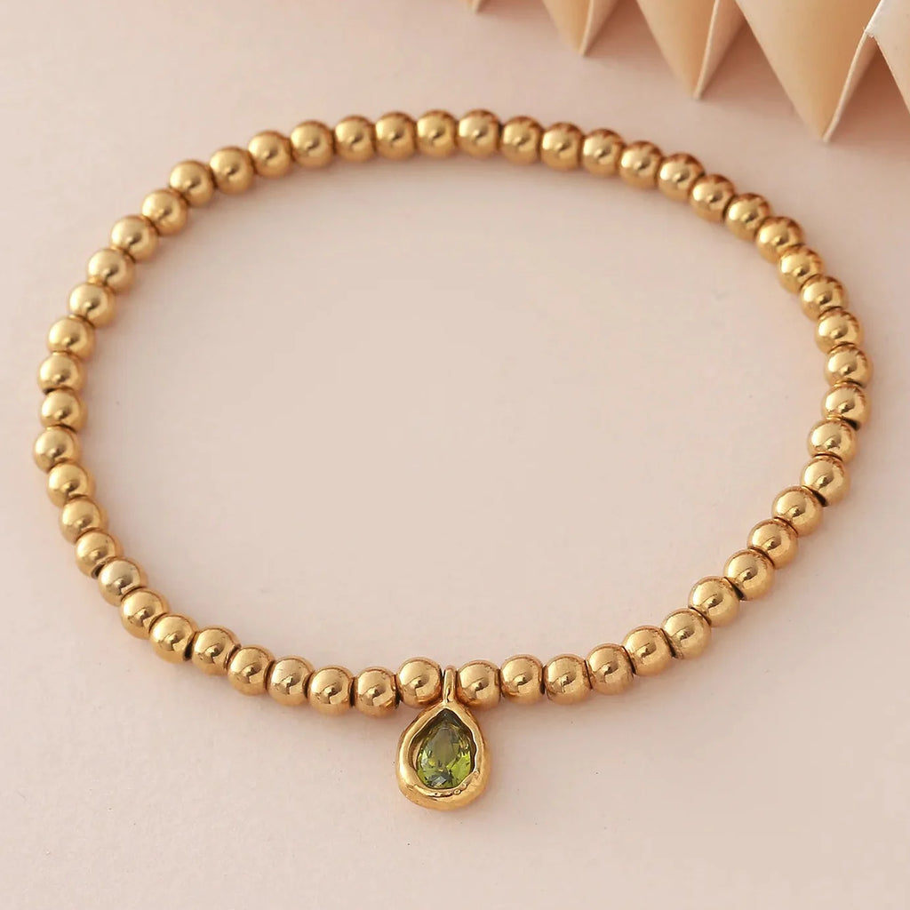Gold-tone bracelet with birthstone for women