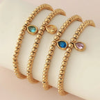 Gold-tone bracelet with birthstone for women