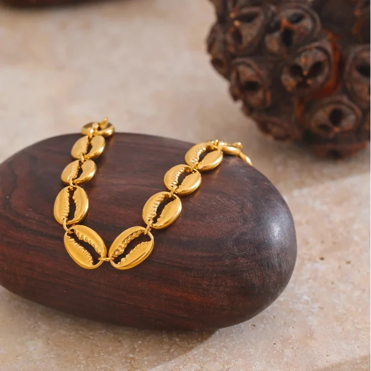 Gold-plated cowrie shell bracelet