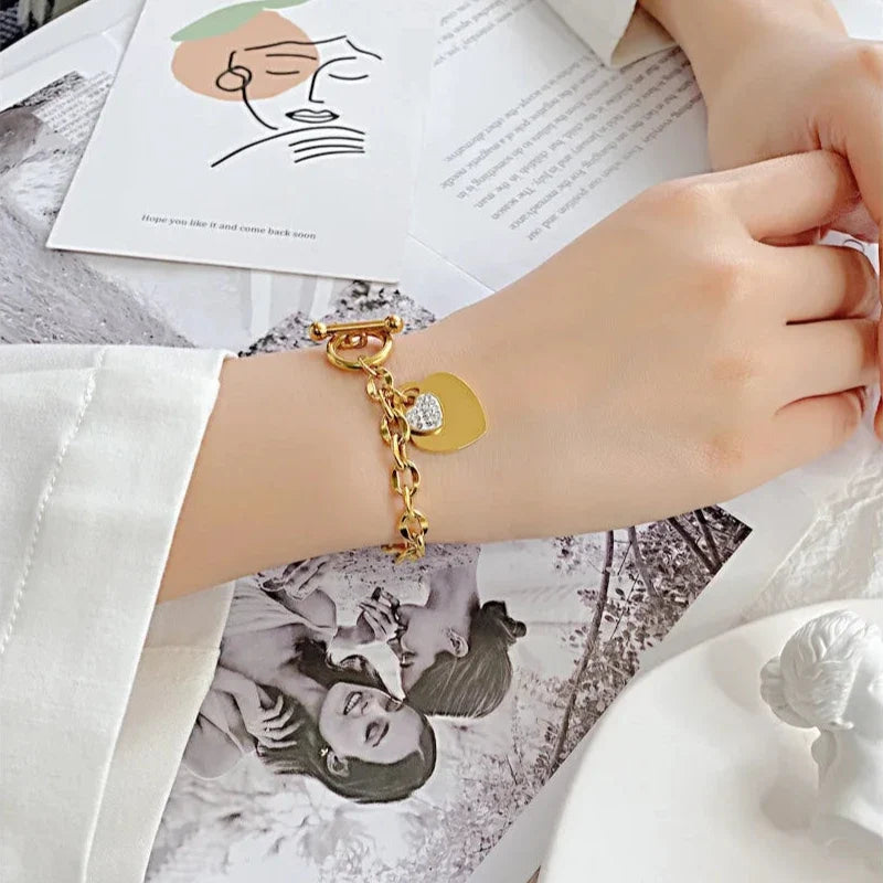 Women’s Double Heart Curb Bracelet in gold