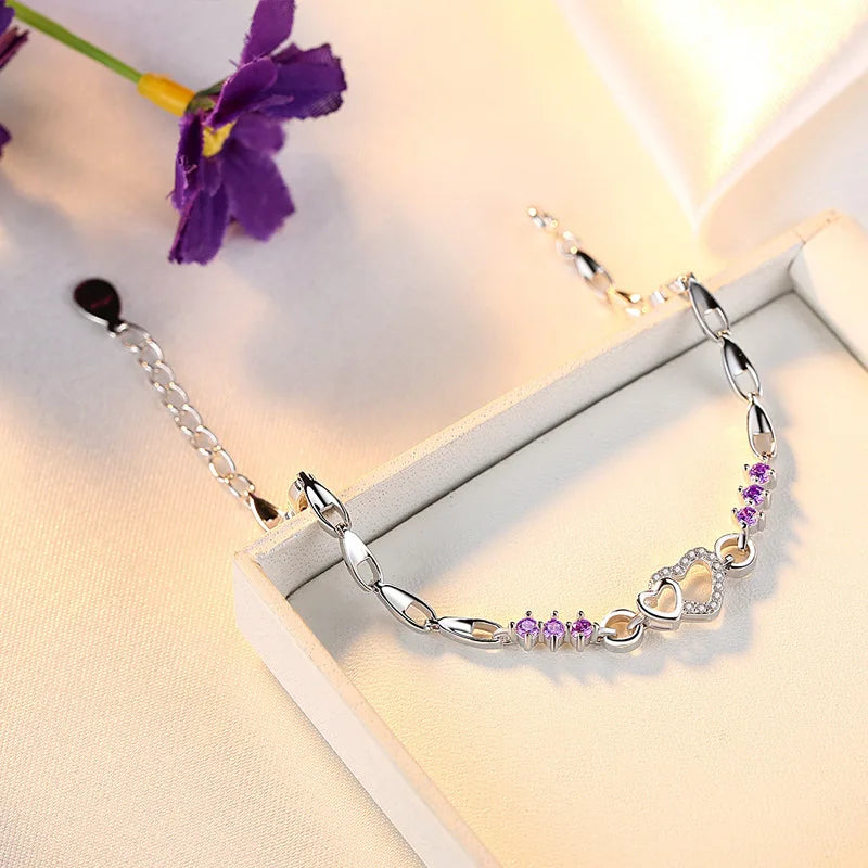  Elegant bracelet with violet zircon heart