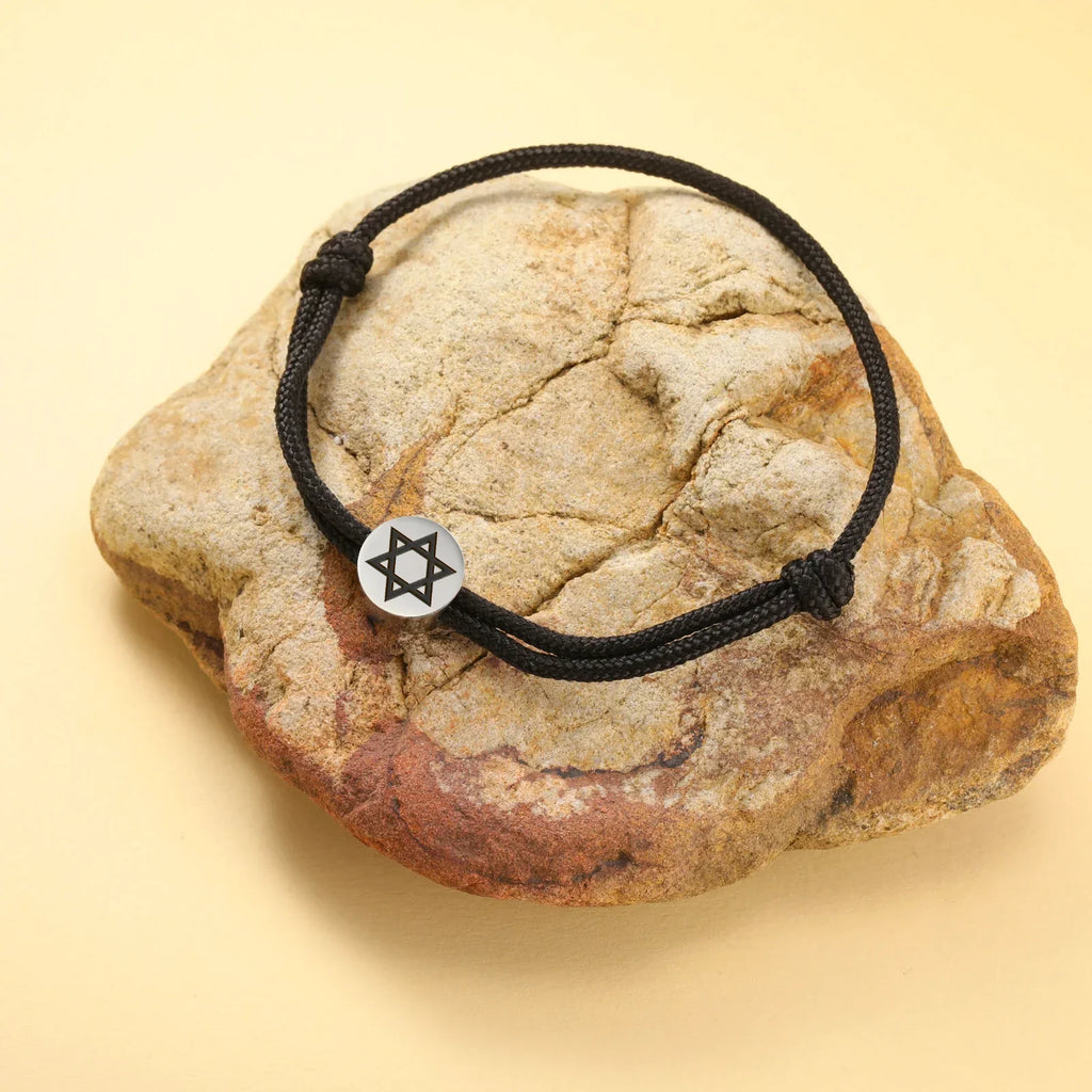 Rope bracelet with the Jewish symbol, the black and silver Star of David