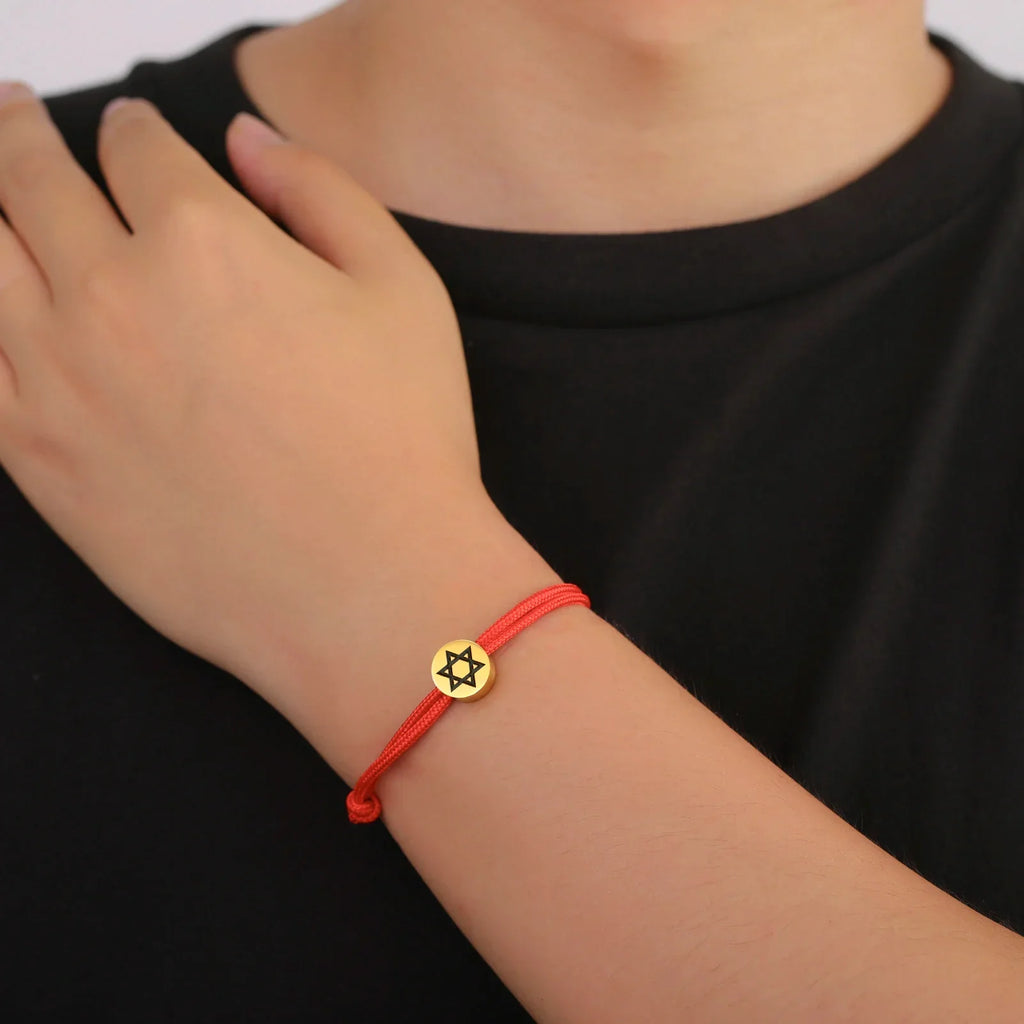 Rope bracelet with the Jewish symbol, the red and gold Star of David