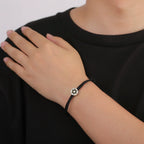 Rope bracelet with the Jewish symbol, the black and silver Star of David