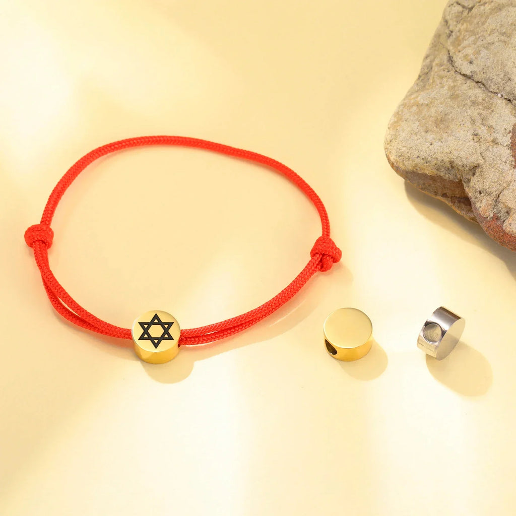 Rope bracelet with the Jewish symbol, the red and gold Star of David