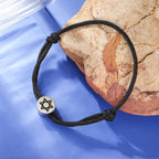 Rope bracelet with the Jewish symbol, the black and silver Star of David