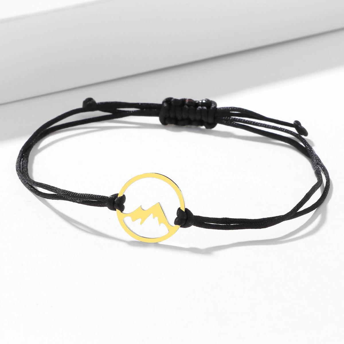Rope Bracelet with Round Mountain Pendant