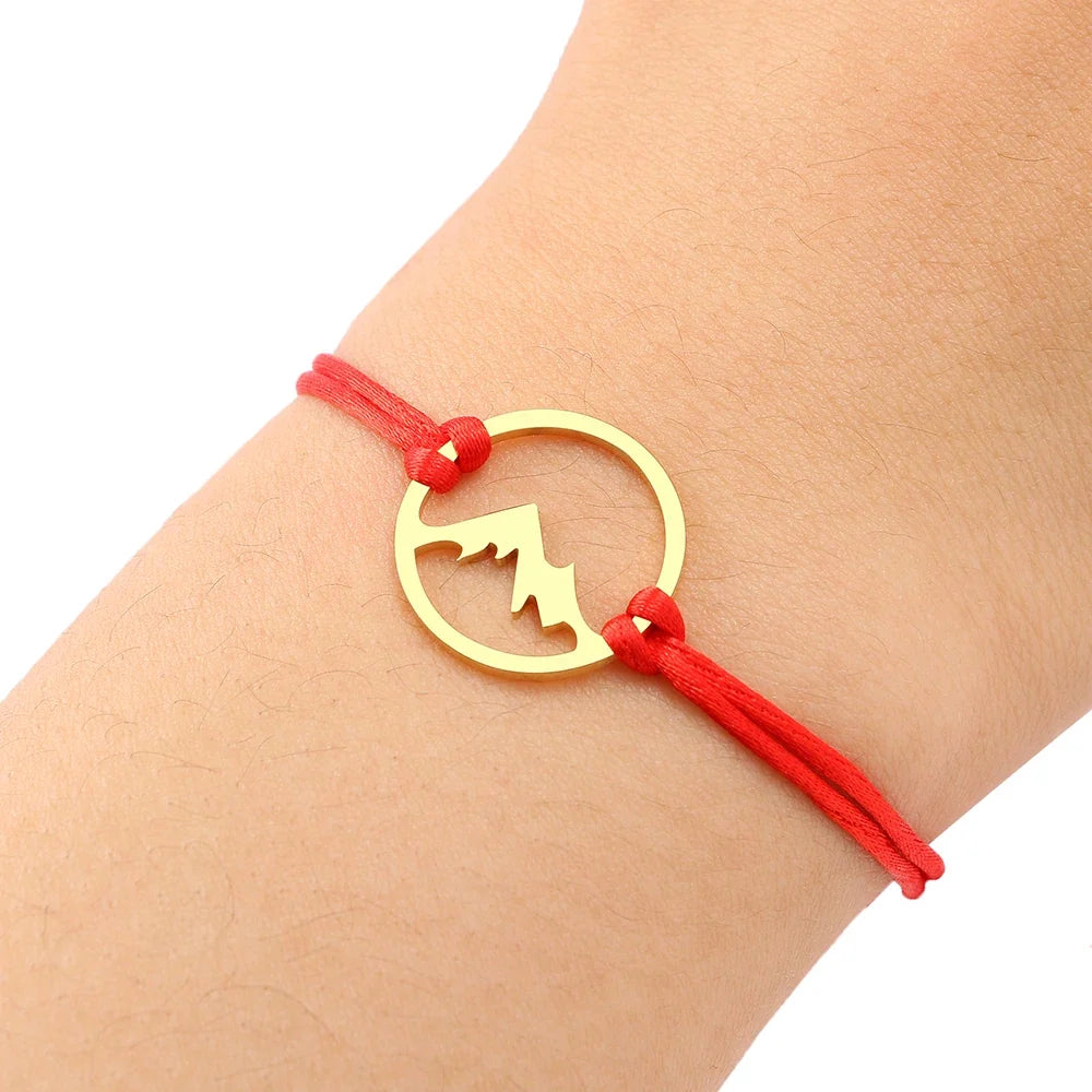 Rope Bracelet with Round Mountain Pendant