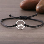 Rope Bracelet with Round Mountain Pendant