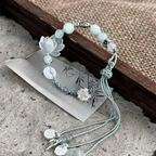 Rope Bracelet with Beads and Lotus Flower