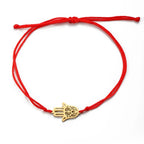 Cord bracelet with Arabic Hand of Fatima in gold