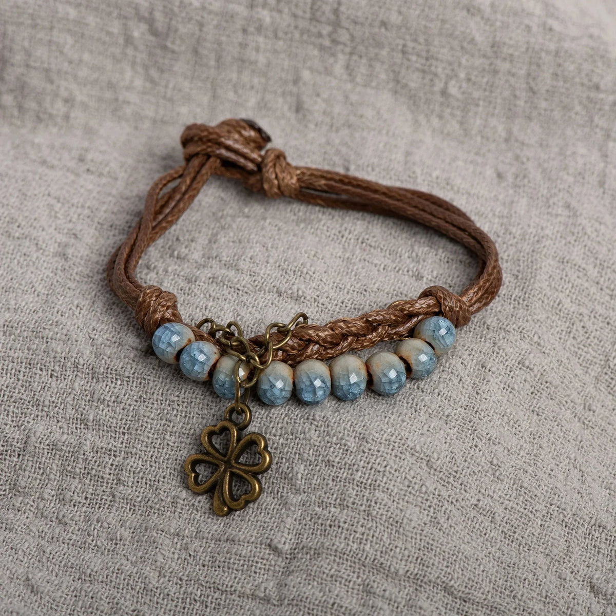 Cord Bracelet with 4-Leaf Clover and Blue Beads