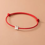 Cord Bracelet with White and Red Four-Leaf Clover