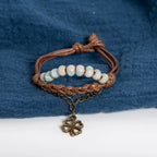 Cord Bracelet with 4-Leaf Clover and Light Blue Beads