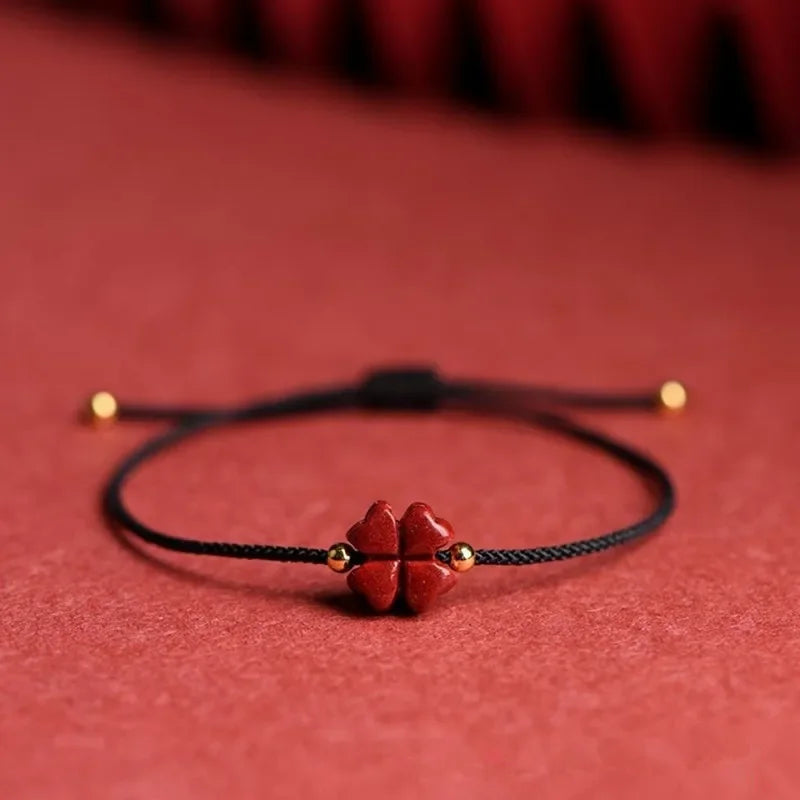 Cord Bracelet with Four-Leaf Clover in Black Cinnabar Stone