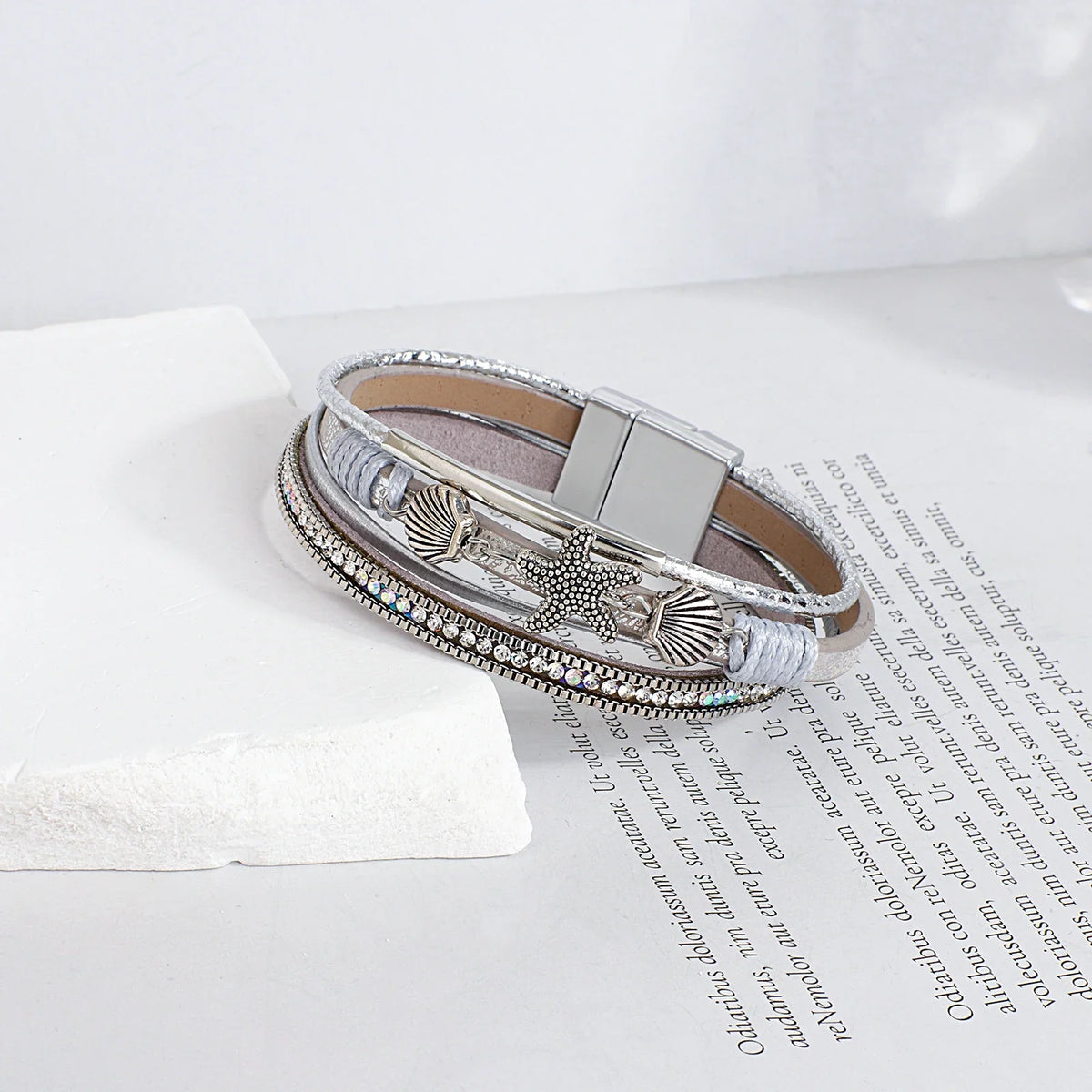 Silver shell and starfish leather bracelet
