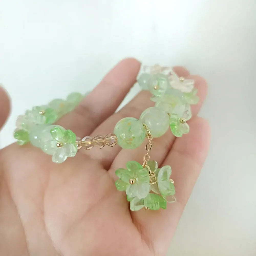 Bracelet with Beads and Green Flowers