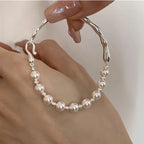 Bracelet with a Figaro Chain and Beautiful White Pearls