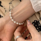 Bracelet with a Figaro Chain and Beautiful White Pearls