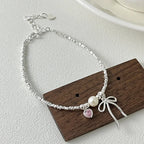 Bow Tie and Pearl Curb Bracelet