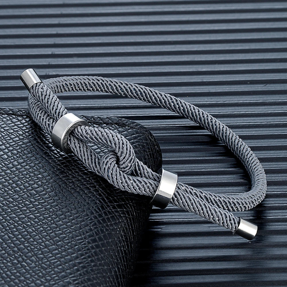 Modern braided cord bracelet with gray knot 
