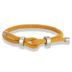 Modern braided cord bracelet with yellow knot
