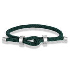Modern braided cord bracelet with dark green knot