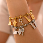 Women's bracelet with keys and locks in silver