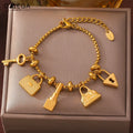 Women's bracelet with keys and locks in gold