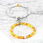 Couples' Magnetic Link Bracelets with white beads and sunstone beads
