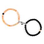 Couples' Magnetic Link Bracelets with sunstone and black beads