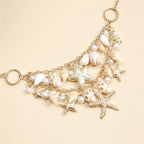 Necklace with large shell and starfish pendant