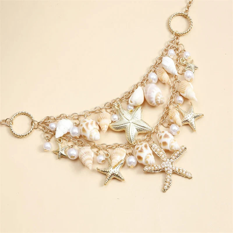 Necklace with large shell and starfish pendant