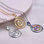 Necklace with large openwork spiral pendant in gold tone