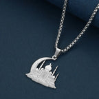 Necklace with a mosque pendant on an Arabic Islamic Muslim crescent moon, silver